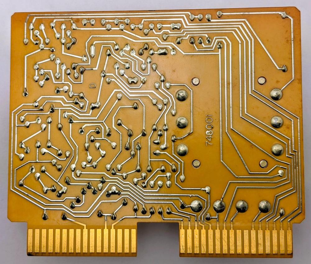 The underside of the printed circuit board for the modem card.