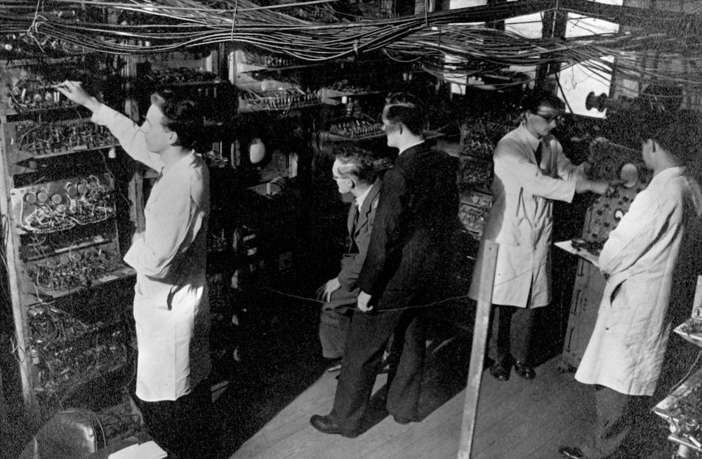 The Manchester Mark 1; Prof. Williams is second from the left. Photo from the University of Manchester.